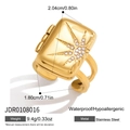 Detailed view of square 18K gold stainless steel ring with starburst pattern and zircon accents - Starburst Pattern (JDR0108016)
