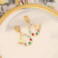 Detailed close-up of butterfly drop earrings with colorful rhinestones on white porcelain - Butterfly Rhinestone Style (5#)