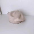 Knitted beige beret for babies and toddlers with cute top pompom detail - Off White