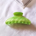 Elegant green marble texture shark hair claw clip displayed on white fabric background - Light Green