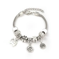 Silver charm bracelet with elephant and tree of life pendants on white background - White (A1-006)