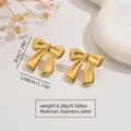Golden bow-shaped stainless steel earrings measuring 3cm by 2.84cm in beach style - Ribbon Bow Earrings (FYD6073)
