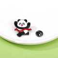Panda enamel pin featuring a red ribbon design with butterfly clutch on ceramic plate - Hula Hoop (C2536-10)