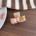 Sweet ribbon hair claw in jelly gradient pink and yellow marble texture acetate - AB Color