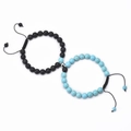 Bracciali di coppia magnetici con lava nera opaca e turchese su uno sfondo bianco - Bracciale di Turchese