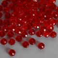 Macro detail of red faceted glass crystal beads for DIY jewelry and accessory making - Red