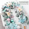 1.8m Snowy Christmas garland with blue and pink ornaments and decorative bows - 1.8m Snowy Mixed Garland Pink Blue
