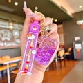 Handheld purple unicorn keychain with glitter sand bottle and soft silicone wristband - Purple Luminous Bubble Bead Coke Can