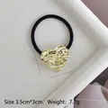 U-shaped alloy ponytail holder with golden heart lava texture and elastic hair tie - Gold Embossed Heart