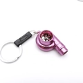Pink turbocharger metal keychain with black leather strap and silver ring detail - Pink