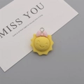 Cute yellow resin sun pendant with a pink bow and silver loop for DIY keychains - Sun with Bow