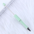 DIY colorful beaded ballpoint pen in pastel macaron green with textured barrel - Pine Green