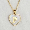 Golden heart necklace with white shell inlay and letter P on white fabric background - Letter P / Gold
