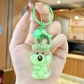 Cute green bear keychain with liquid sand and white alphabet blocks inside a resin shell - Mini Sitting Bear - Green