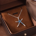Silver starfish pendant necklace with blue glitter inlay in a luxury jewelry box - Star Style 5