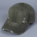 Close-up of distressed army green washed denim baseball cap with vintage frayed holes - M (56-58cm) / Green