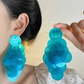 Detail showing oversized layered blue sequin tassel earrings worn for a visual size guide - Blue Long Style / Blue