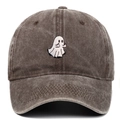 Macro detail of ghost embroidery on vintage washed cotton baseball cap with retro finish - Coffee