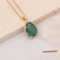 Macro detail of teardrop emerald zircon pendant with gold beaded edging and chain - Teardrop Style (5#)