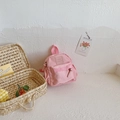 Pink minimalist kids backpack featuring a 'GIRL CATS' embossed patch and lightweight fabric - Pink