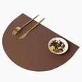 Semicircular brown faux leather placemat with textured finish and golden cutlery set - Coffee