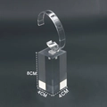 Transparent acrylic watch display stand with a black cube base and C-ring holder - Large (8CM Base) / Clear