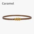 Women's slim leather belt in caramel brown with wavy gold metal buckle design - Caramel color