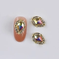 Golden alloy nail charm with AB teardrop zircon and white crystal border for bridal art - Gold Edged AB Iridescent Waterdrop