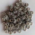 Macro shot of silver metal big hole beads with sparkling clear rhinestones for DIY jewelry - Black With White Rhinestone