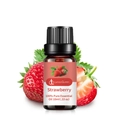 10ml strawberry essential oil in amber glass bottle with fresh strawberries on side - Strawberry Aromatherapy
