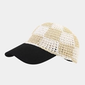 Detail of hand-woven straw baseball cap with beige checkerboard pattern and black visor - Beige and White Grid