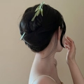 Green glass bamboo hair pin styled in black hair for an elegant traditional look - Green Bamboo Shape (36#) / Green