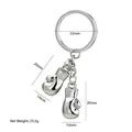 Polished silver metal boxing gloves keychain with dimension marks and 23.5g net weight - Left and Right Pair / Bright Silver
