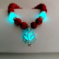 Yoga energy bracelet with red turquoise beads and glowing blue lotus flower charm - Red Turquoise Cyan Glow