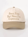 Detail shot of Born Free embroidery and contrast brim on the baseball cap - Off-White/Dark Khaki