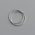 Detailed view of large polished S925 sterling silver hoop earrings with a minimalist design - 28mm / White Gold