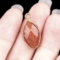 Marquise cut goldstone charm with rose gold plated edging for DIY jewelry making - Gold Sand Stone (Synthetic)