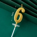Golden metallic number 6 birthday candle with 4.4cm height on a textured background - Golden Long Number Candle 6