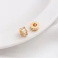 Detailed view of 14K gold plated wheel spacers with baguette-cut cubic zirconia inlays - Style 8 / 7.5x4mm / 14K Gold