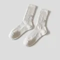Men's cotton crew socks in white with black side embroidery on a woven texture - One Size / White