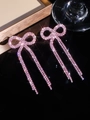 Pink rhinestone bow earrings with long tassels in a sparkling copper finish - Stud Earrings / Pink