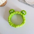 Cute green plush frog headband with big eyes design for washing face and skincare - Tosca Hairband