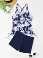 Detailed flat lay of navy tankini swimwear with palm tree print and side drawstrings - S / Blue and White Print