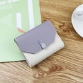 Women's trifold wallet in grey-purple and beige faux leather with floral buckle - Light Purple