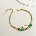 Detail of double-layer gold stainless steel bracelet with hollow leaf and green beads - Emerald Green