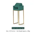 Green velvet watch stand with tall gold metal frame for window display and storage - Sofa Seat High
