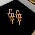Gold-tone irregular geometric drop earrings with long rectangular tassel charms in a box - Geometric Tassel / Gold