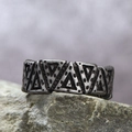 Nordic Viking vintage triangular relief steel ring on stone background - Antique Silver / US 9