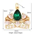 Gold plated crown pendant with green teardrop gemstone and dimensions 25mm by 24mm - Red M84