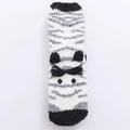 Fuzzy coral fleece Christmas socks featuring black and white zebra pattern and 3D ears - Knitted Zebra